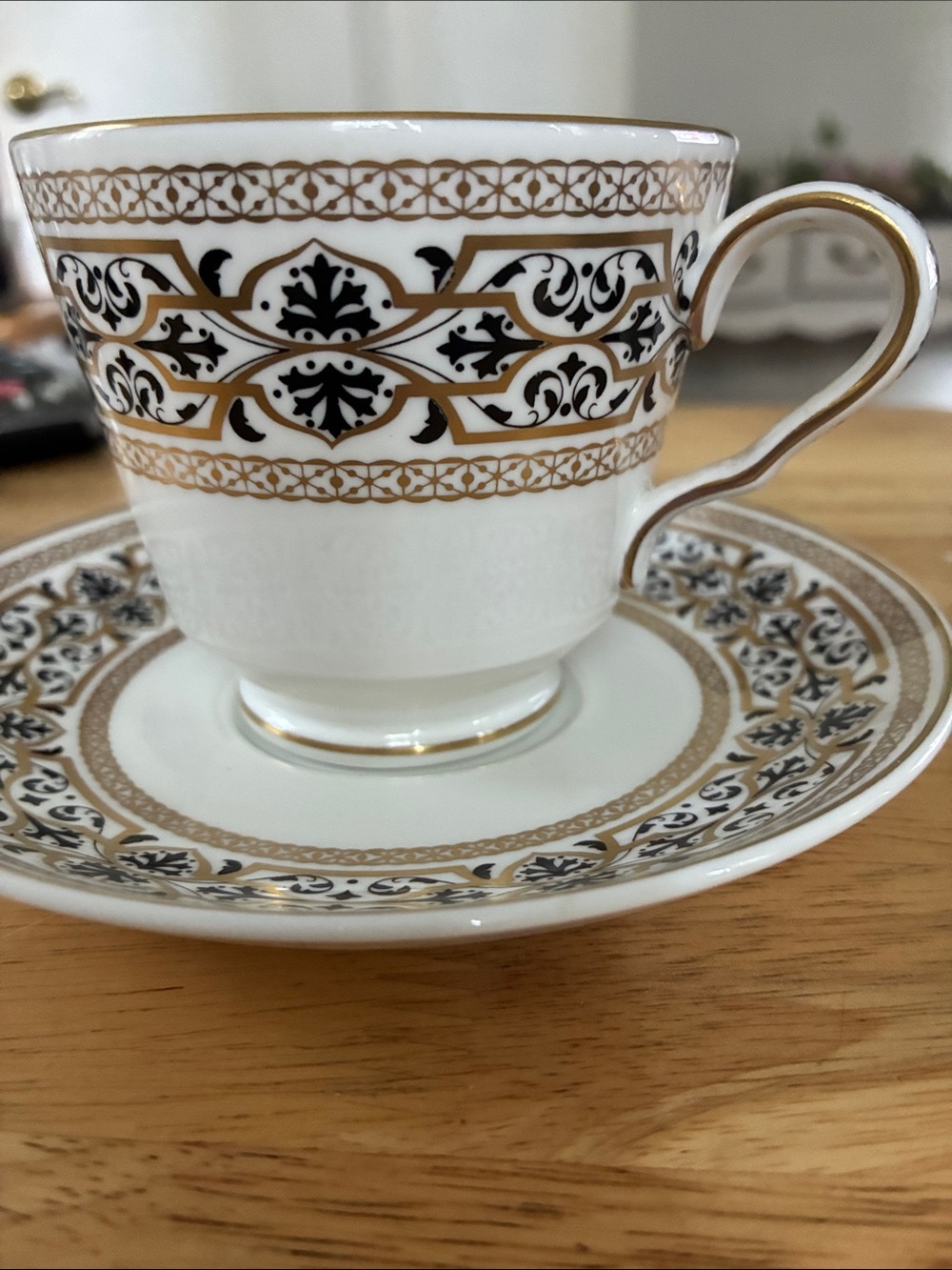 Spode White Teacup & Saucer with Black and Gold Scrollwork Mantilla